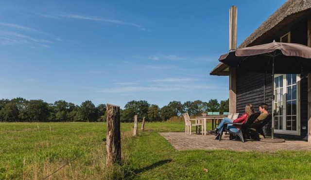 Authentic haystack in Wierden with a terrace in Wierden