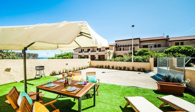 Casa al Mare con Parcheggio Privato in Lu Bagnu