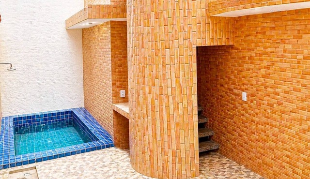 Casa com piscina e churrasqueira a 100m da praia perfeita para famílias in Praia Grande
