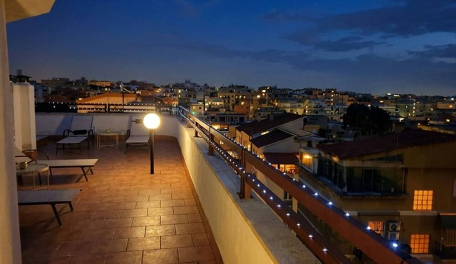 Elegant Penthouse with a 100-square-meter Private Terrace, City View, and Parking Near Trastevere in Roma